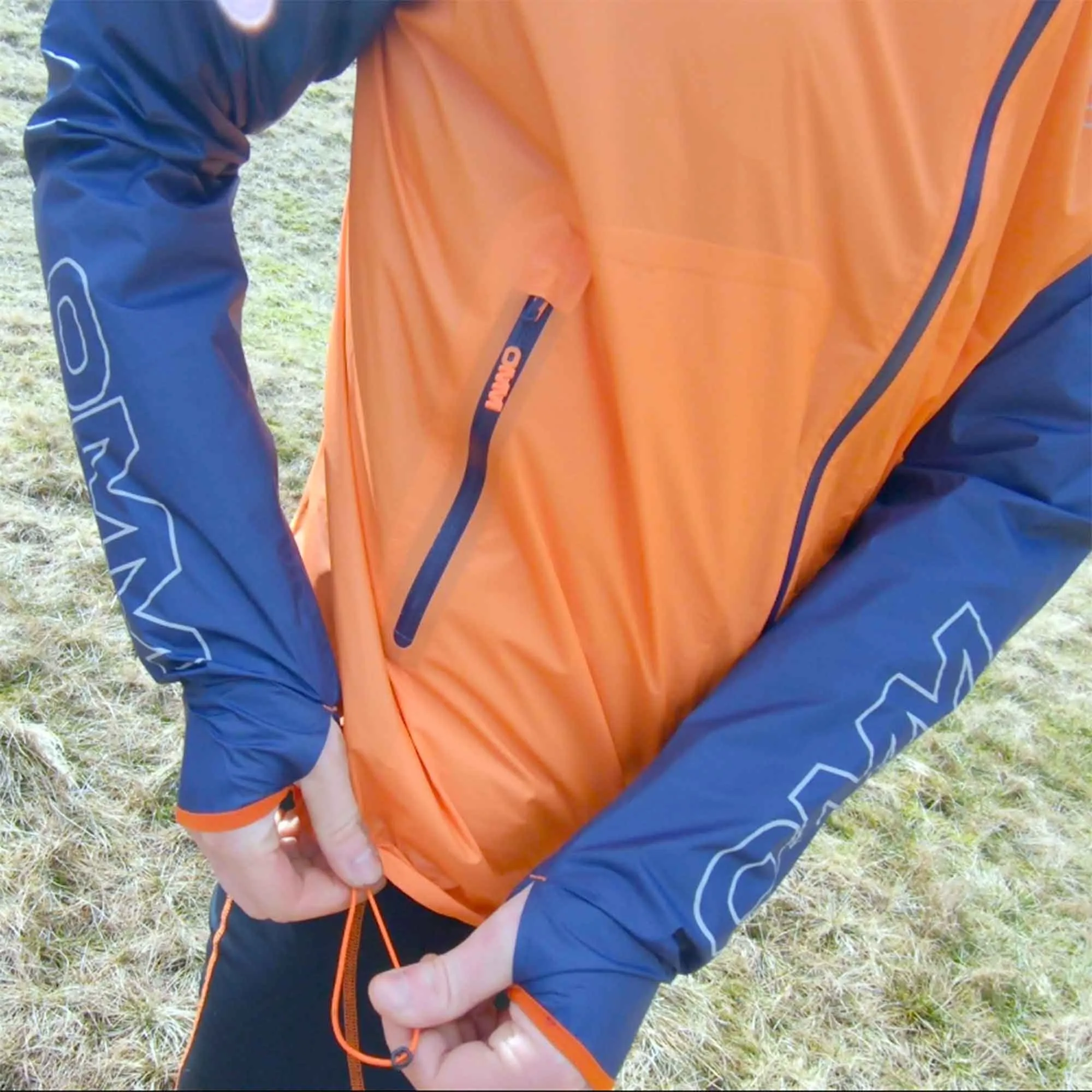 OMM  Halo+ Mens Waterproof Running Jacket Navy/Orange