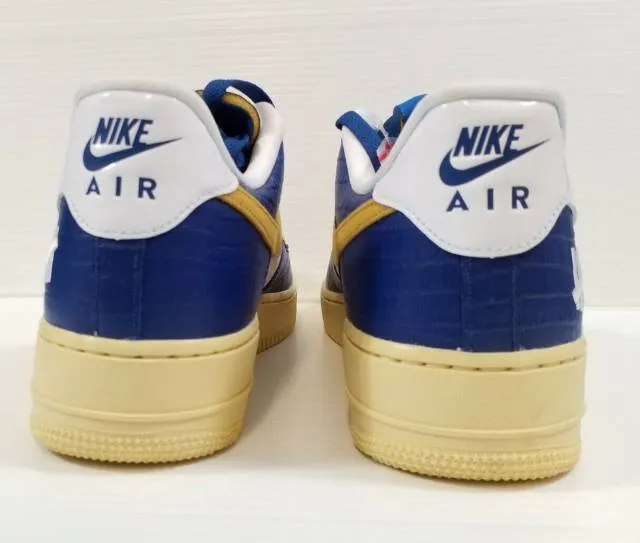 Undefeated x nike air force 1 5 on it gold blue