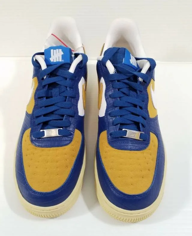 Undefeated x nike air force 1 5 on it gold blue